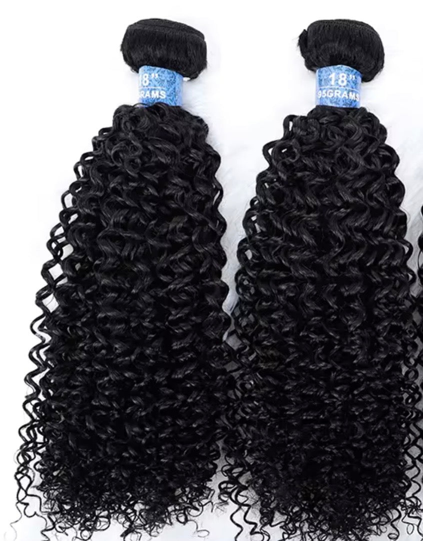 Two bundles of black curly hair wefts displayed side by side against a white background.