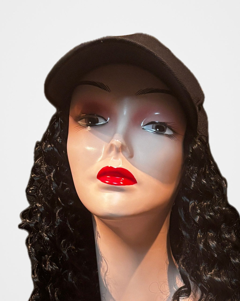 Black Baseball Cap w/16” Synthetic Hair, studio photo