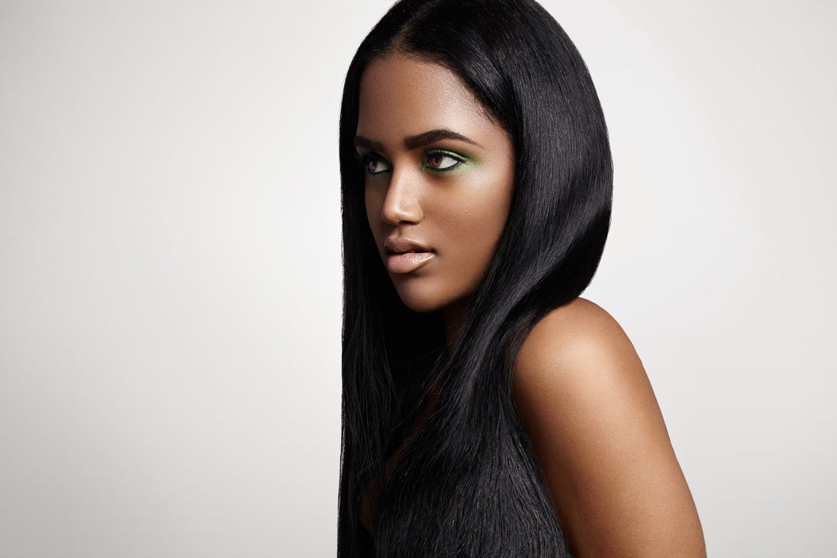 Woman with long, straight black human hair